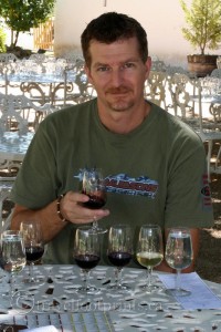 man-holding-wine-glass-franschhoek-winelands-south-africa