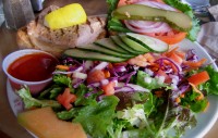 hornby-island-thatch-pub-salmon-burger-salad-plate