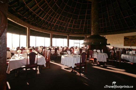 ngorongoro-sopa-lodge-crater-dining-room-eating-restaurant-table-cloths-rondavel-building-thatch-roof
